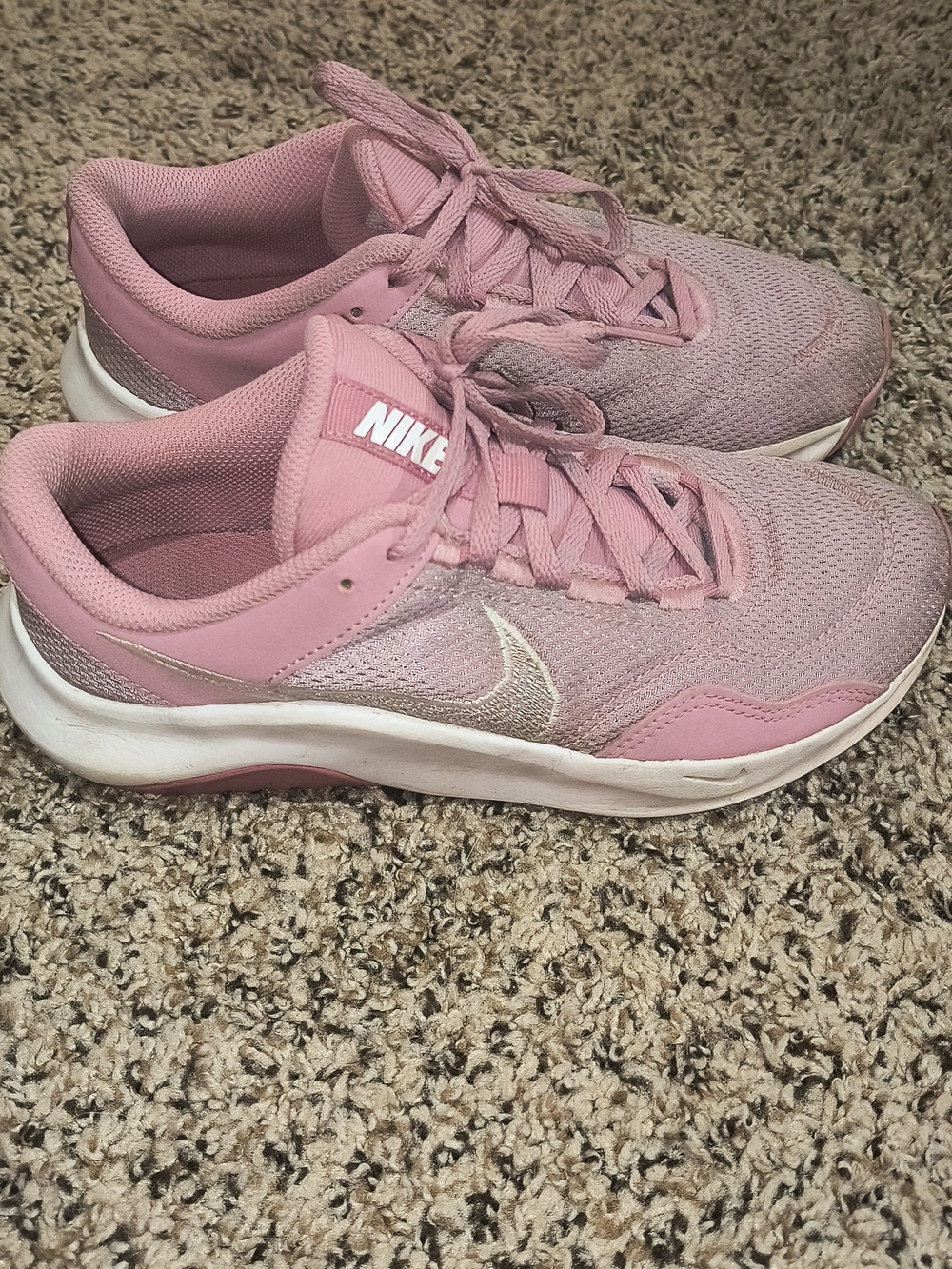 Nike Women's Pink Mesh Athletic Sneakers with Silver Swoosh